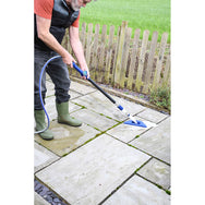 Faithfull Water Flow Telescopic Extension Pole in use cleaning an outdoor patio - imagen 5