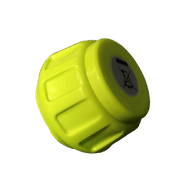 Yellow cylindrical object with a label on a green background