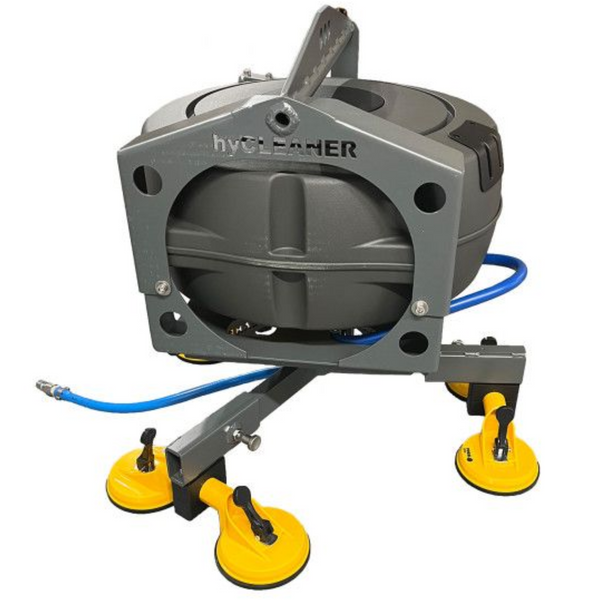 Gray cleaning device with yellow suction cups on a white background