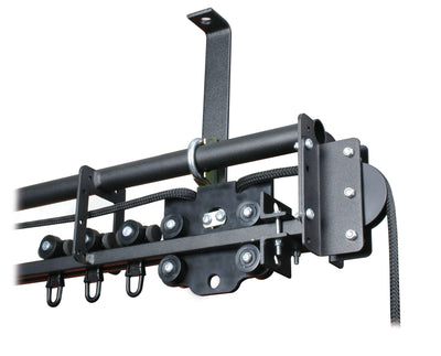 Doughty SixTrack line operated curtain track — close-up of master runner, pulleys and ball raced runners assembled on straight track section