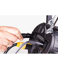 Man plugging cable into a socket